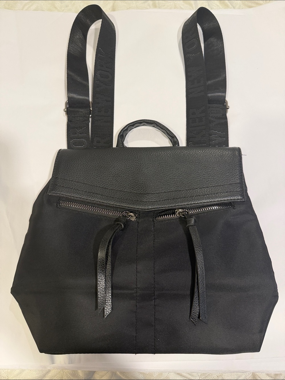 Botkier New York Black mini backpack with silver hardware.